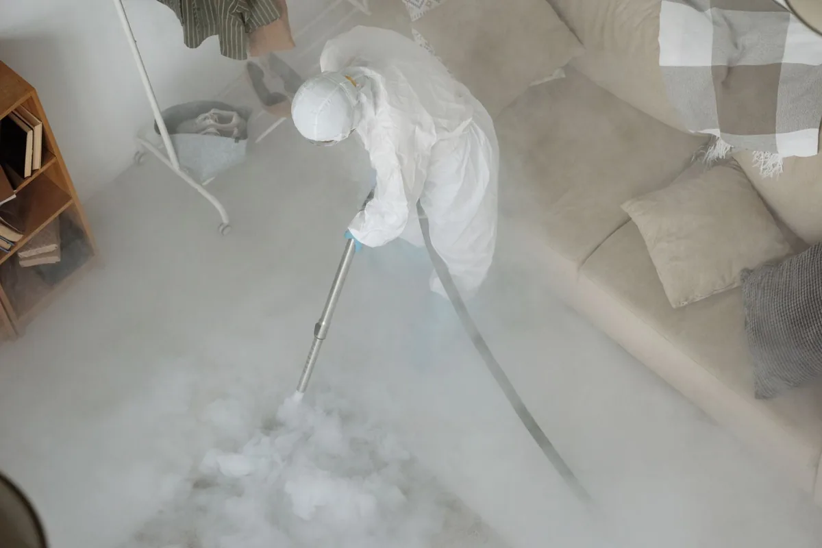 Biohazard cleanup technician in protective equipment, Ebensburg, PA